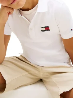 Polo en coton blanc à coupe droite pourvu d'un col à revers boutonné