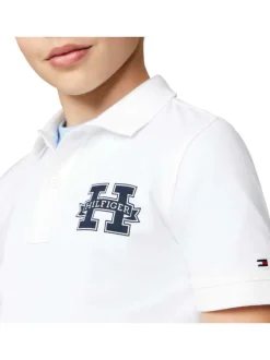 Polo en coton blanc uni avce une coupe droite et un col boutonné