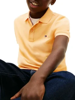 Polo en coton jaune à coupe droite pourvu d'un col à revers boutonné