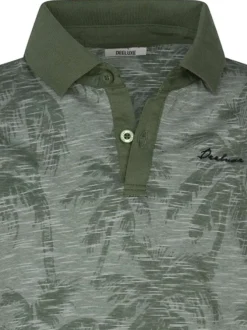 Polo en coton vert d'eau avec des motifs une coupe droite et un col à revers