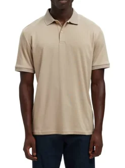 Polo beige uni avec un col à revers boutonné et des manches courtes