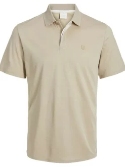 Polo beige uni avec une coupe regular fit et un col boutonné