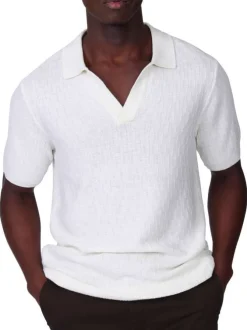 Polo blanc à coupe droite pourvu d'un col V et de manches courtes