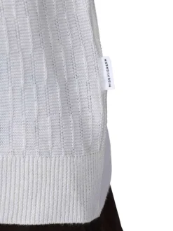 Polo blanc à coupe droite pourvu d'un col V et de manches courtes