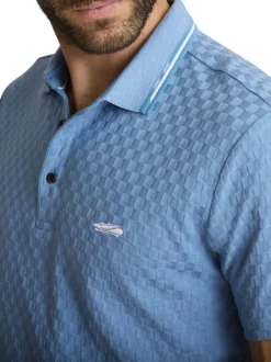 Polo bleu à coupe droite pourvu d'un col boutonné et de manches courtes