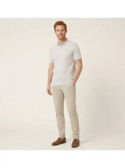 Polo en coton beige à coupe droite pourvu d'un col côtelé boutonné