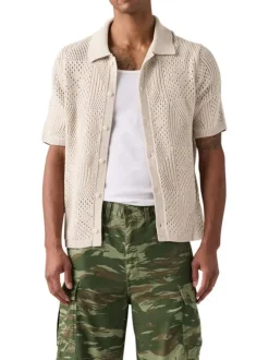 Polo en coton beige à coupe droite pourvu d'un col à revers côtelé