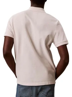 Polo en coton beige à coupe droite pourvu d'un col v bord-côte