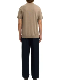 Polo en coton beige uni avec une coupe droite et un col boutonné