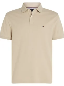 Polo en coton beige uni avec une coupe droite et un col polo