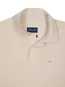 Polo en coton beige uni avec une coupe droite et un col à revers