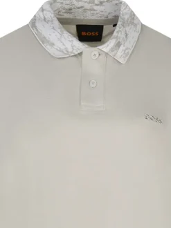 Polo en coton beige uni avec une coupe droite et un col à revers