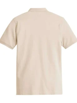 Polo en coton beige uni avec une coupe slim fit et patch cousu sur la poitrine