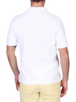 Polo en coton biologique blanc uni avec une coupe droite et un col à revers