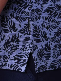 Polo en coton biologique bleu à coupe droite pourvu d'un col boutonné