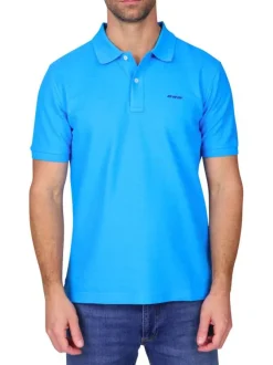 Polo en coton biologique bleu uni avec une coupe droite et un col à revers