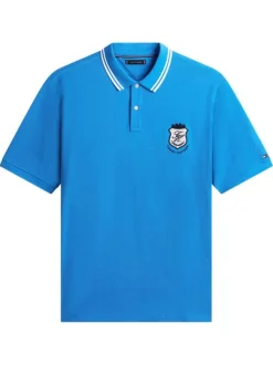 Polo en coton biologique bleu uni pourvu d'un col boutonné et de manches courtes