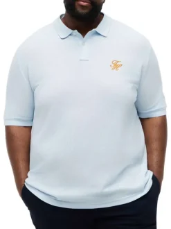 Polo en coton biologique ciel uni pourvu d'une coupe droite et d'un col boutonné
