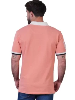 Polo en coton biologique corail uni pourvu d'un col boutonné