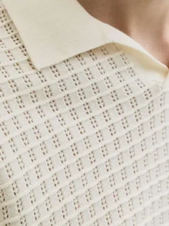 Polo en coton biologique écru à coupe droite pourvu d'un col à revers