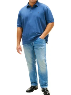 Polo en coton biologique indigo uni avec une coupe droite et un col boutonné