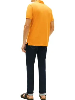 Polo en coton biologique jaune à coupe droite pourvu d'un col à revers