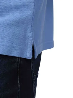 Polo en coton biologique lavande uni avec une coupe droite et un col à revers