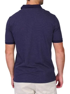 Polo en coton biologique marine uni avec une coupe droite et un col boutonné