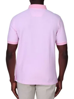 Polo en coton biologique rose à coupe droite pourvu d'un col boutonné