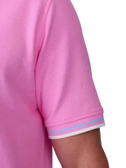 Polo en coton biologique rose uni avec une coupe droite et un col boutonné