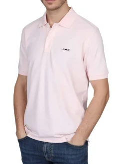 Polo en coton biologique rose uni avec une coupe droite et un col à revers