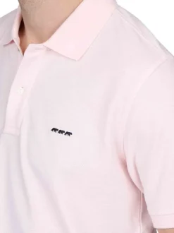 Polo en coton biologique rose uni avec une coupe droite et un col à revers