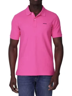 Polo en coton biologique rose uni avec une coupe droite et un col à revers