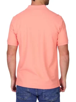 Polo en coton biologique rose uni avec une coupe droite et un col à revers