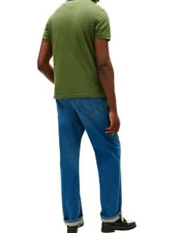 Polo en coton biologique vert à coupe ajustée pourvu d'un col boutonné