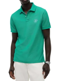 Polo en coton biologique vert uni avec une coupe droite et un col boutonné
