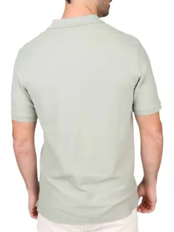 Polo en coton biologique vert uni avec une coupe droite et un col à revers