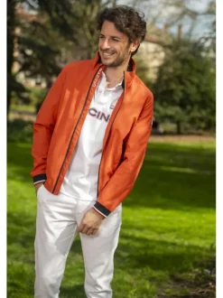 Polo en coton blanc à coupe droite pourvu d'un col à revers boutonné