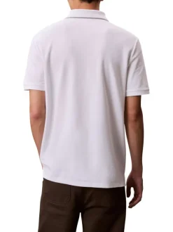 Polo en coton blanc à coupe droite pourvu d'un col à revers boutonné
