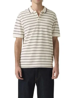 Polo en coton blanc à rayures avec une coupe droite et un col boutonné