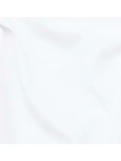 Polo en coton blanc uni avec une coupe droite et un col boutonné