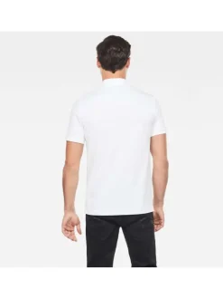 Polo en coton blanc uni avec une coupe droite et un col boutonné