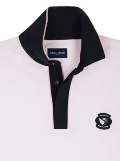 Polo en coton blanc uni avec une coupe droite et un col à revers