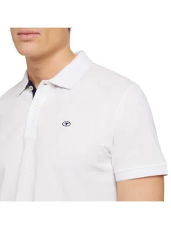 Polo en coton blanc uni coupe droite avec un col fermé par 2 boutons