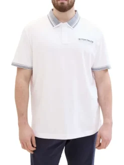 Polo en coton blanc uni coupe droite avec un col français et nom de la marque