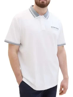 Polo en coton blanc uni coupe droite avec un col français et nom de la marque
