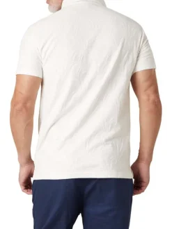 Polo en coton blanc uni pourvu d'une coupe droite et d'un col boutonné