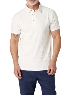 Polo en coton blanc uni pourvu d'une coupe droite et d'un col boutonné
