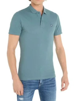 Polo en coton bleu avec une coupe droite un col boutonné et logo à la poitrine