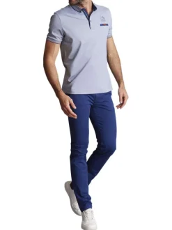 Polo en coton bleu chiné avec un col américain et une poche à la poitrine